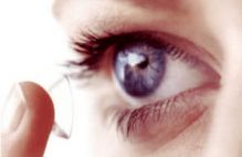 Putting in a contact lens
